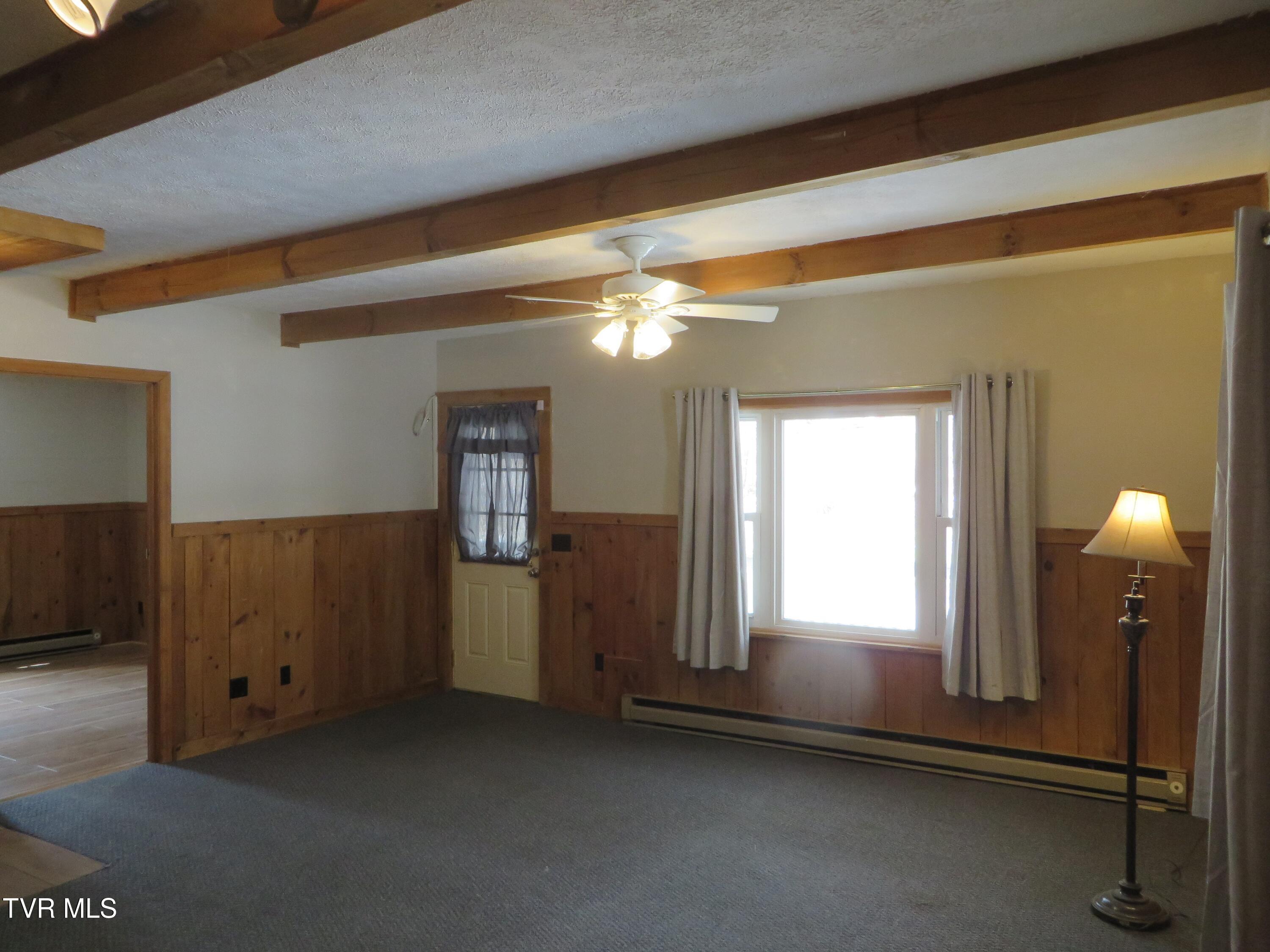 492 Forge Creek Road Mountain City, TN 37683 - Photo 12 of 44 Front door with bedroom from kitchen