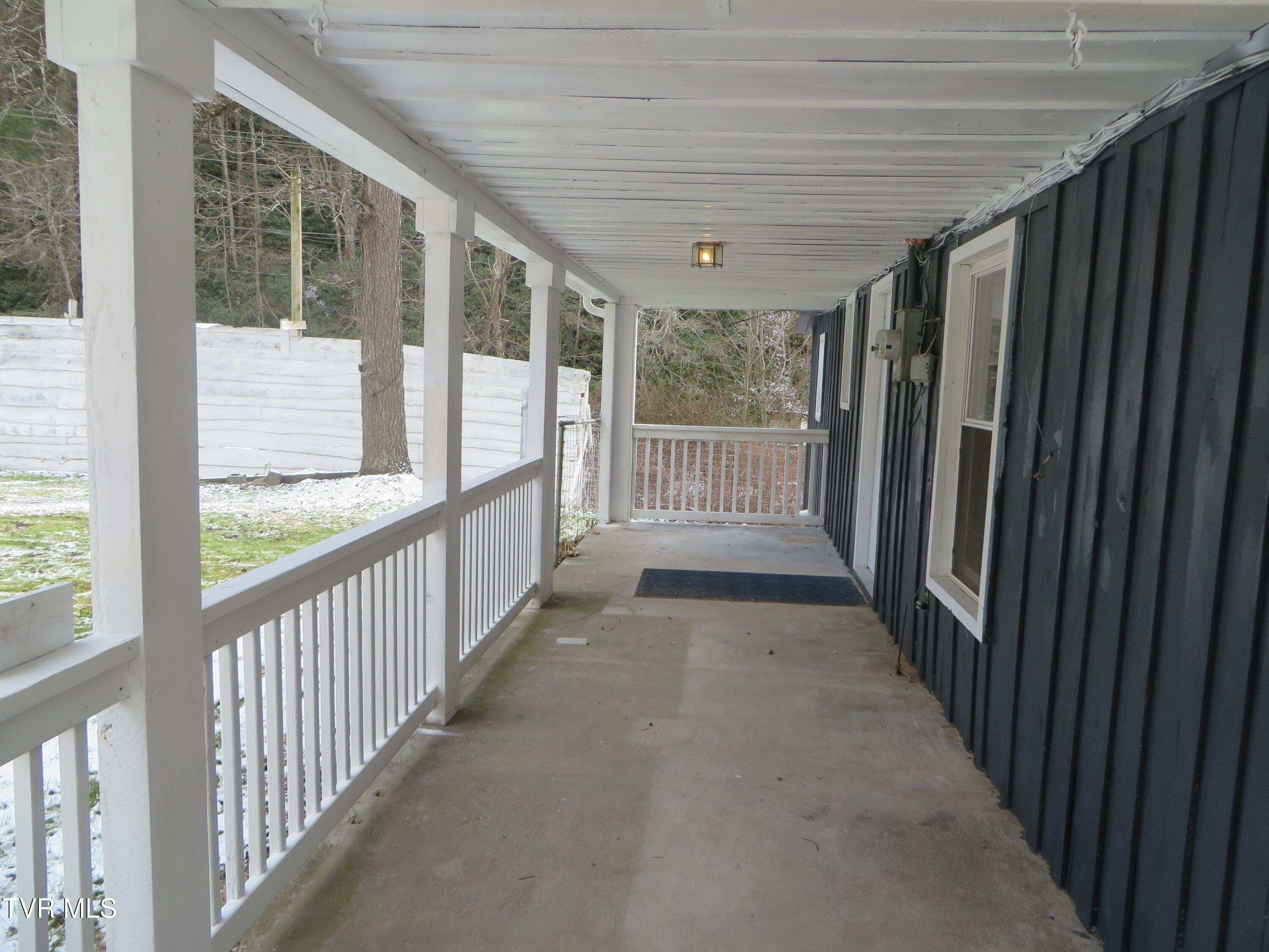 492 Forge Creek Road Mountain City, TN 37683 - Photo 7 of 44 outside side porch