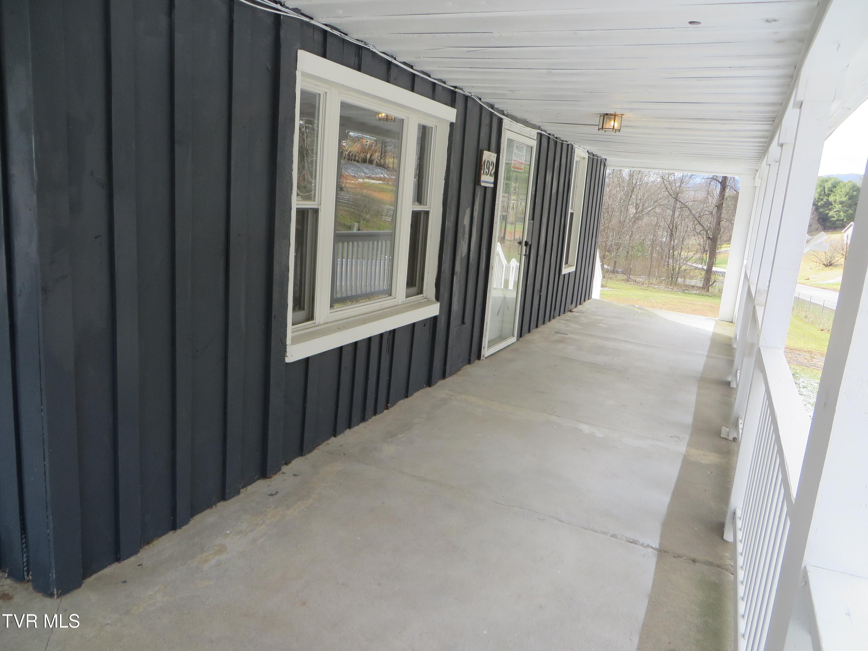 492 Forge Creek Road Mountain City, TN 37683 - Photo 8 of 44 Outside front porch