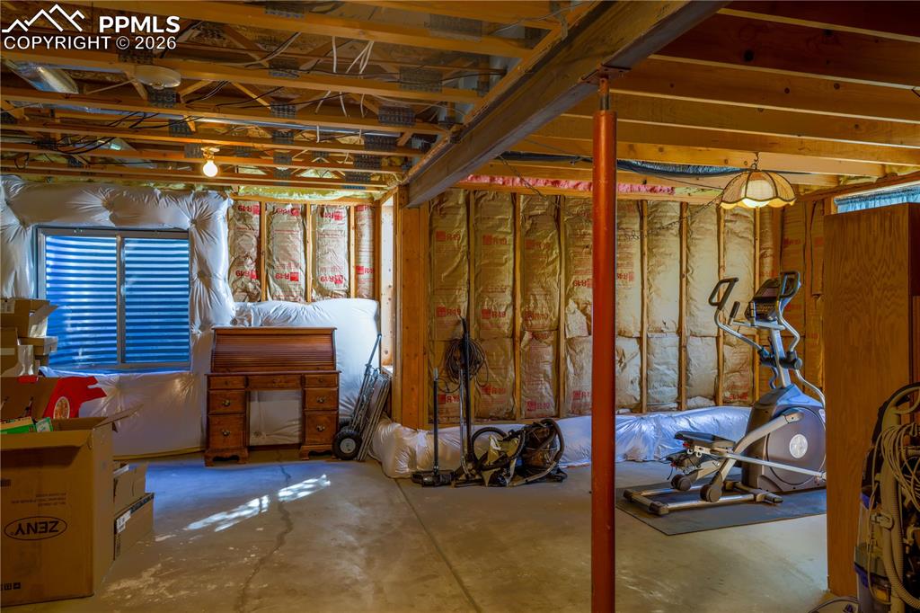 5440 Setters Way Colorado Springs, CO 80919 - Photo 33 of 40 a view of a room with gym equipment
