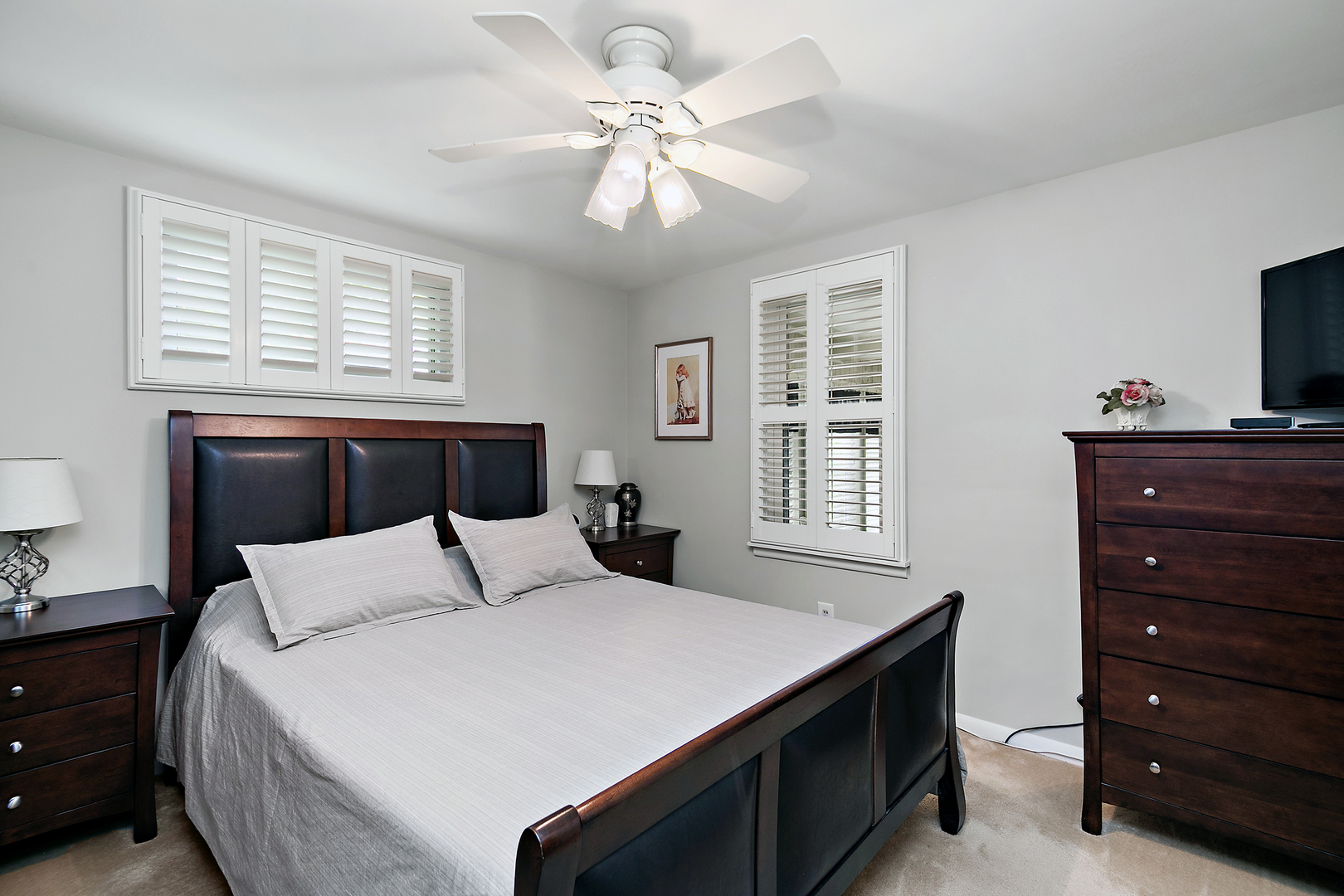 2 Jan Avenue Kankakee, IL 60901 - Photo 11 of 19 a bedroom with a bed and a dresser