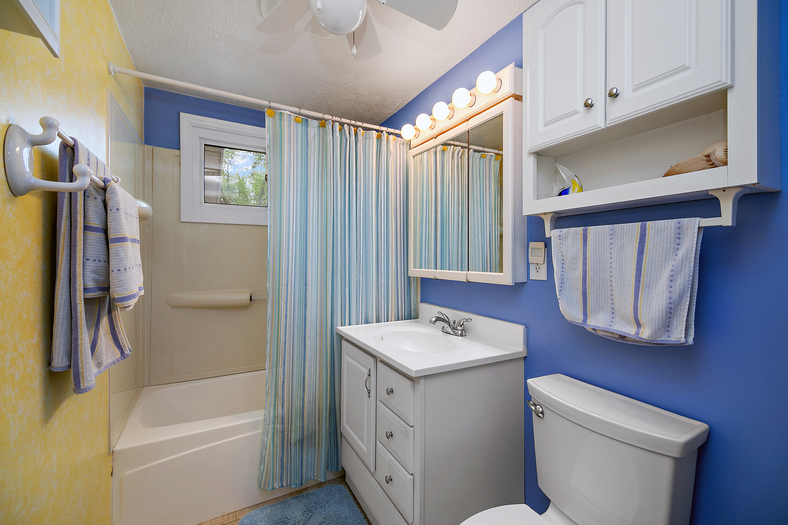 2 Jan Avenue Kankakee, IL 60901 - Photo 12 of 19 a bathroom with a sink a toilet and shower