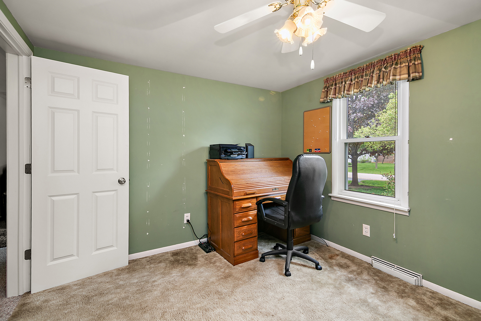 2 Jan Avenue Kankakee, IL 60901 - Photo 14 of 19 a view of a workspace with furniture and a window