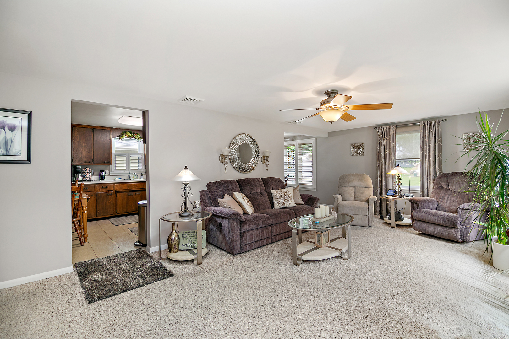 2 Jan Avenue Kankakee, IL 60901 - Photo 5 of 19 a living room with furniture and a chandelier