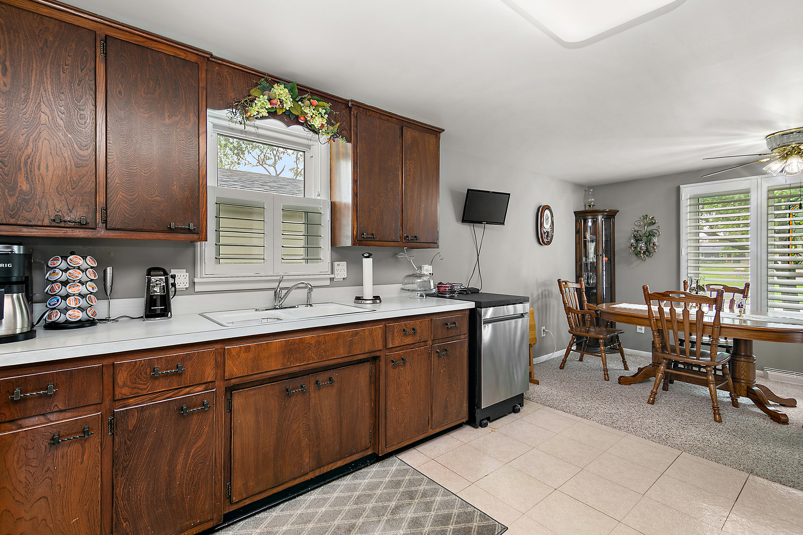 2 Jan Avenue Kankakee, IL 60901 - Photo 7 of 19 a kitchen with sink cabinets and window