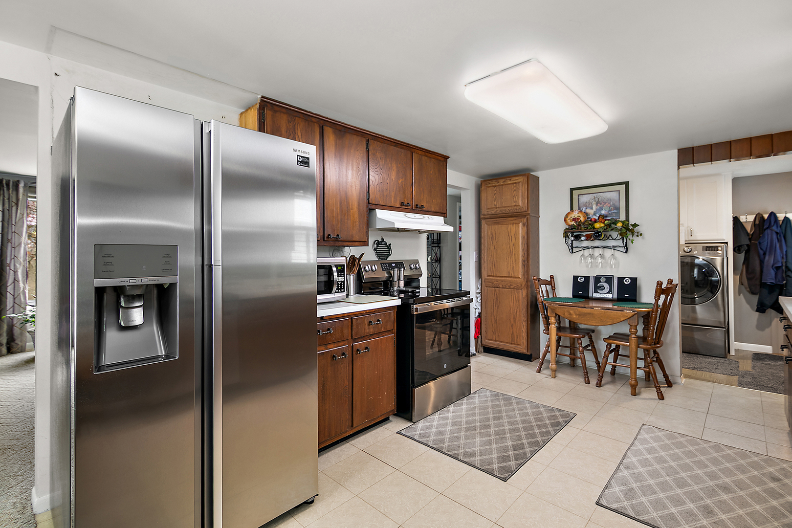2 Jan Avenue Kankakee, IL 60901 - Photo 8 of 19 a kitchen with stainless steel appliances granite countertop a refrigerator and a stove top oven