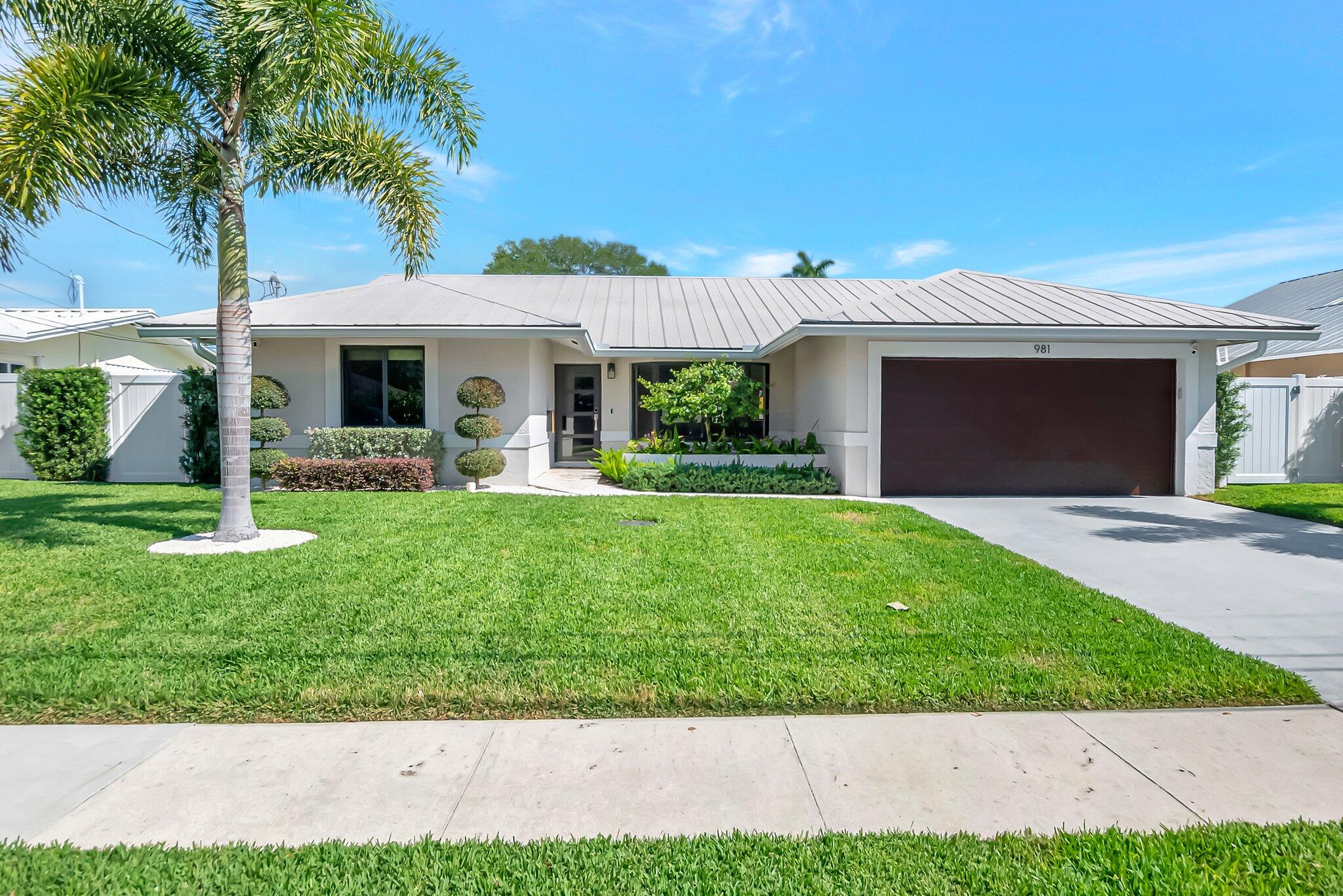 981 Southwest 8th Street Boca Raton, FL 33486 - Photo 2 of 22 Front Exterior