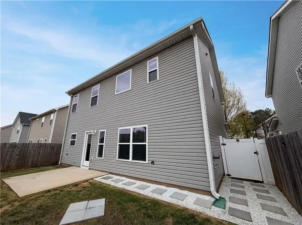 a view of a house with a garage