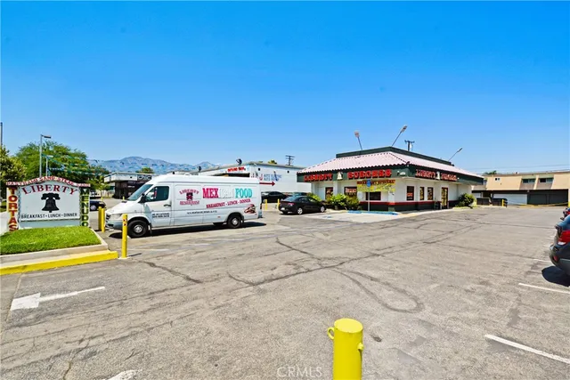 an aerial view of a parking space with patio