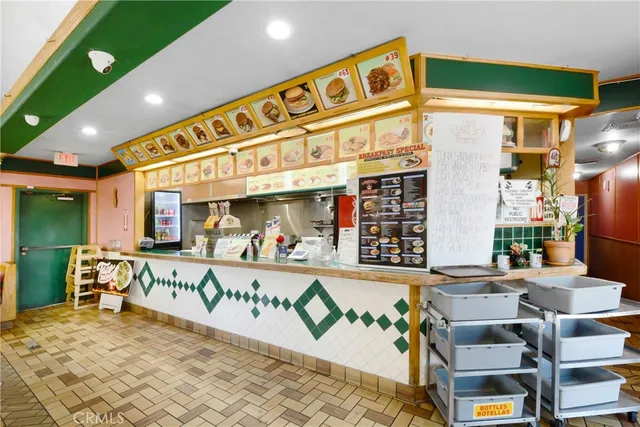 a view of a building with sitting area