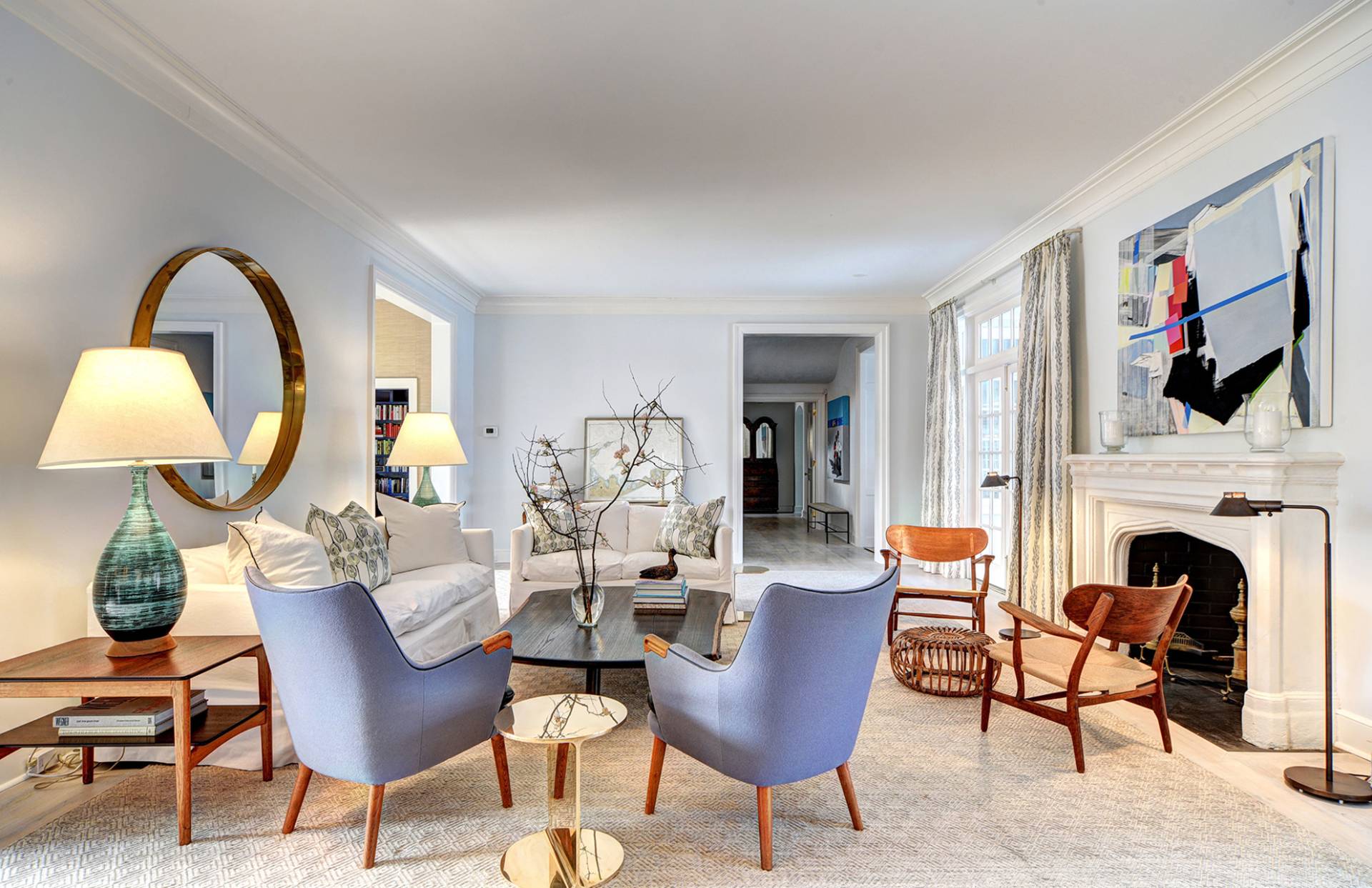 63 Middle Lane East Hampton, NY 11937 - Photo 14 of 39 a living room with furniture a fireplace and a flat screen tv