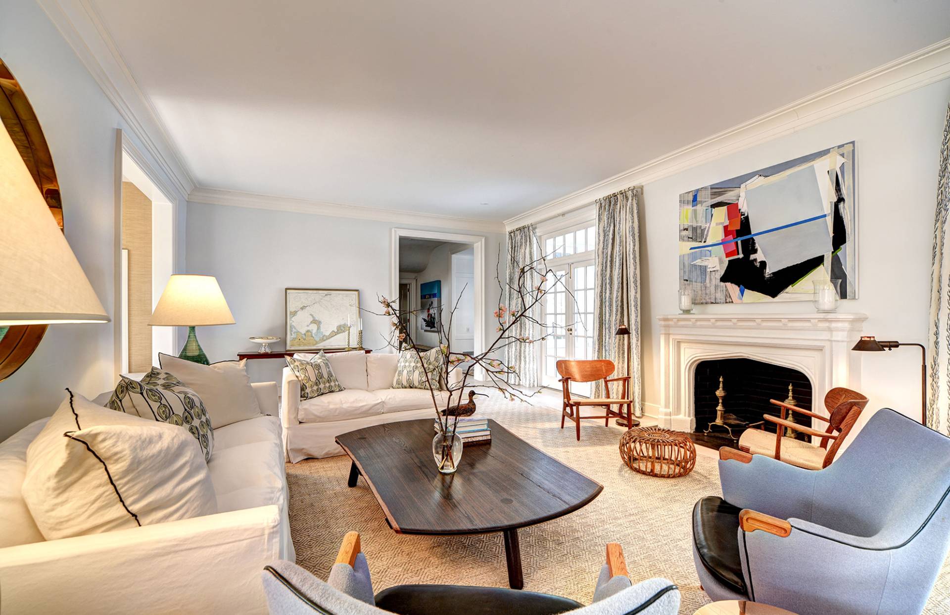 63 Middle Lane East Hampton, NY 11937 - Photo 15 of 39 a living room with furniture fireplace and a large window