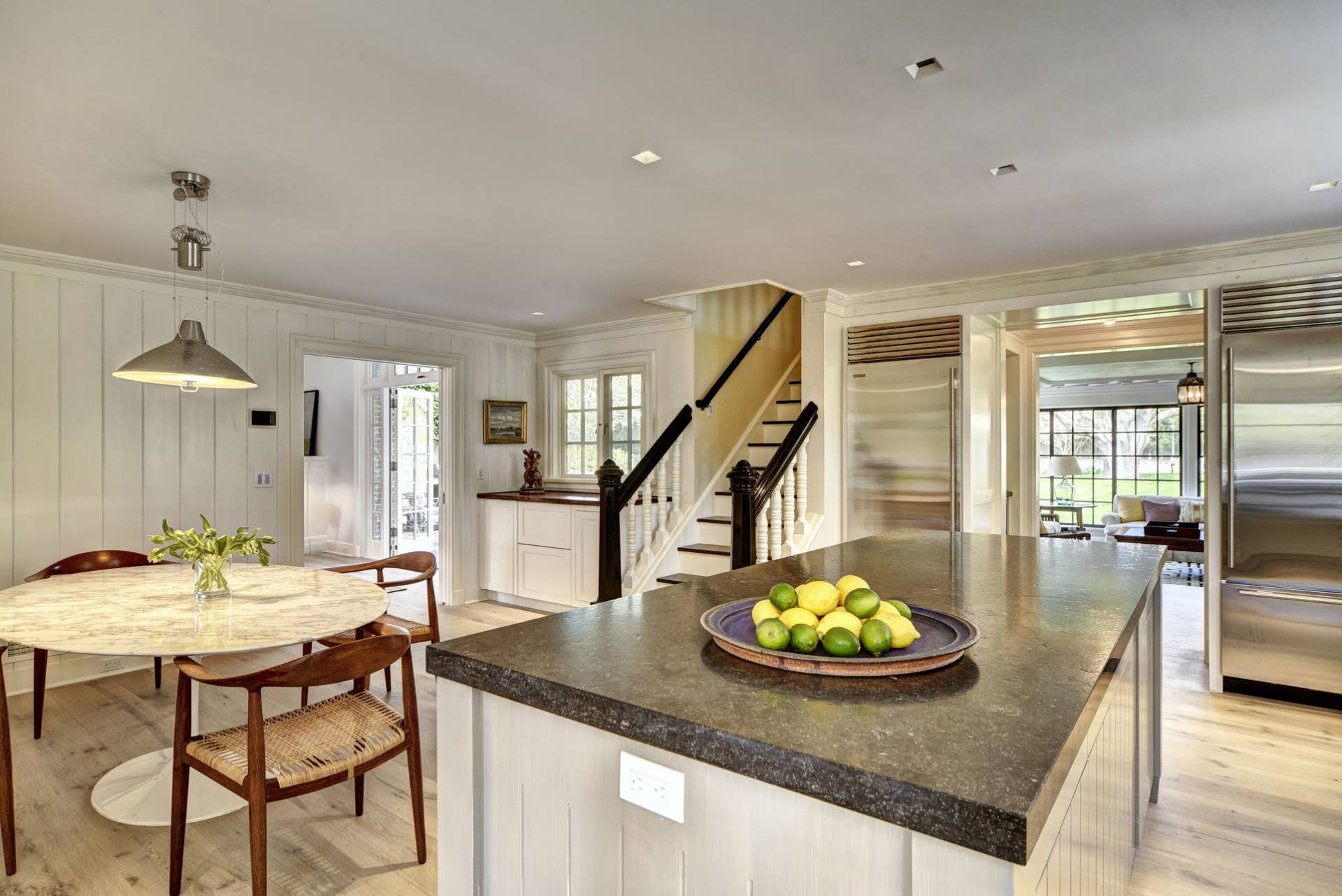 63 Middle Lane East Hampton, NY 11937 - Photo 17 of 39 a living room with furniture and a table