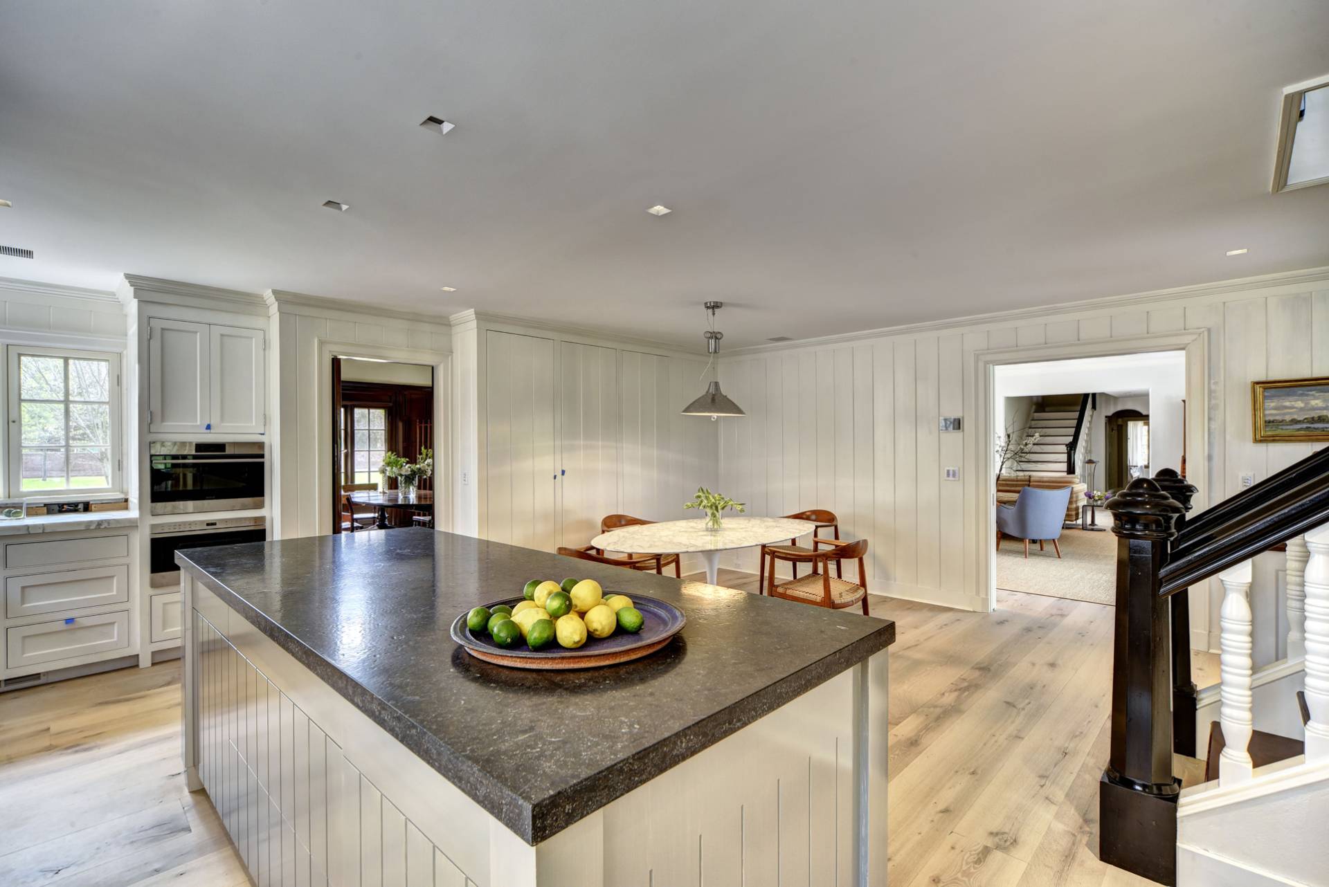 63 Middle Lane East Hampton, NY 11937 - Photo 19 of 39 a kitchen with sink and breakfast area