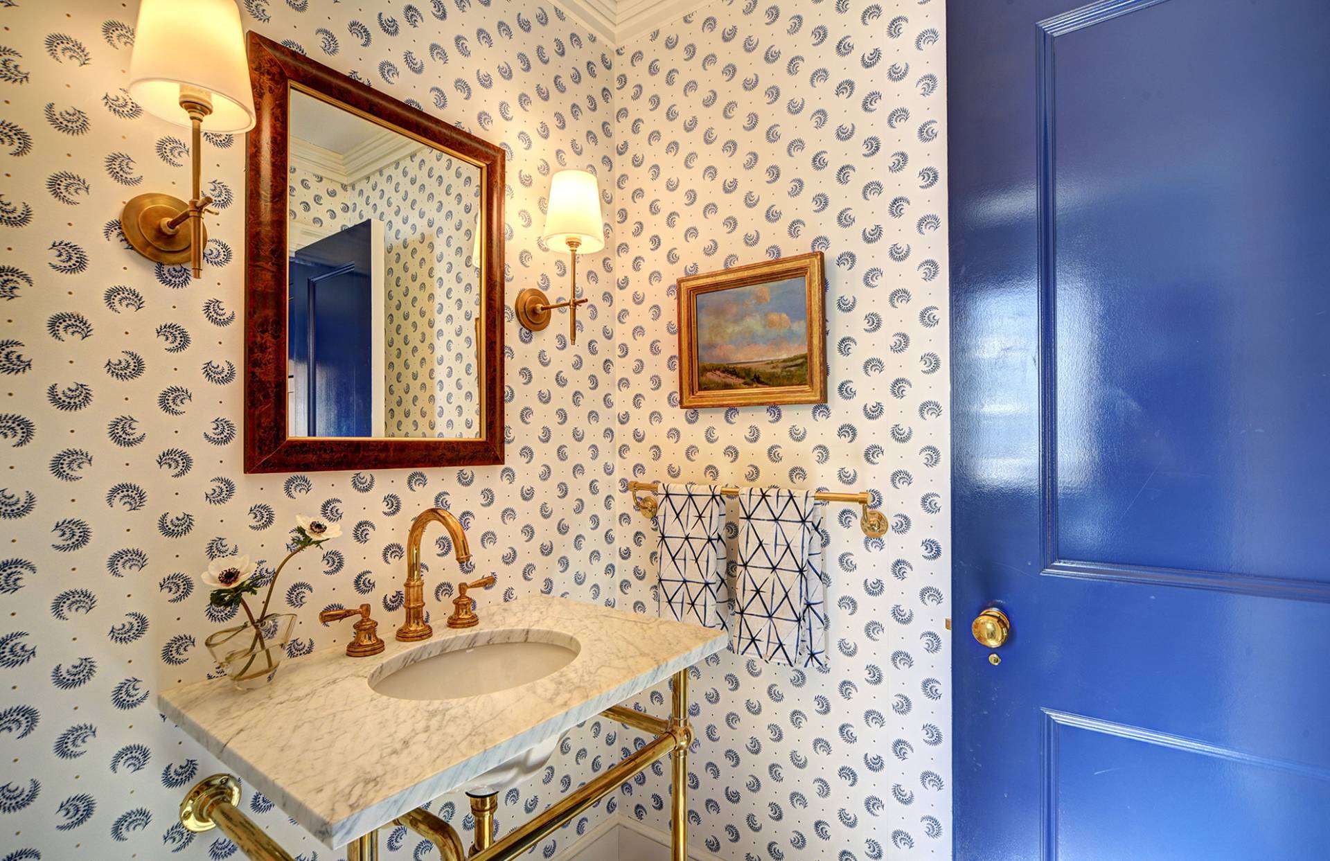 63 Middle Lane East Hampton, NY 11937 - Photo 24 of 39 a bathroom with a sink and a mirror