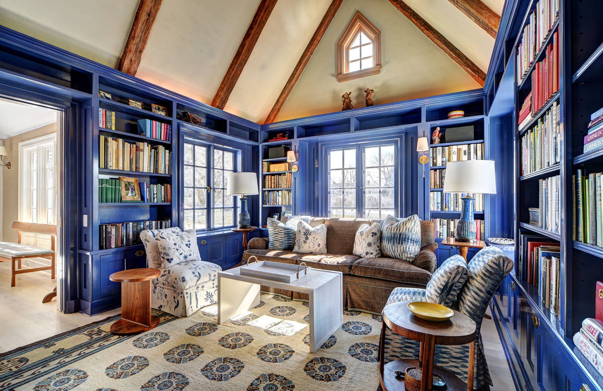 63 Middle Lane East Hampton, NY 11937 - Photo 26 of 39 a living room with furniture fireplace and a large window