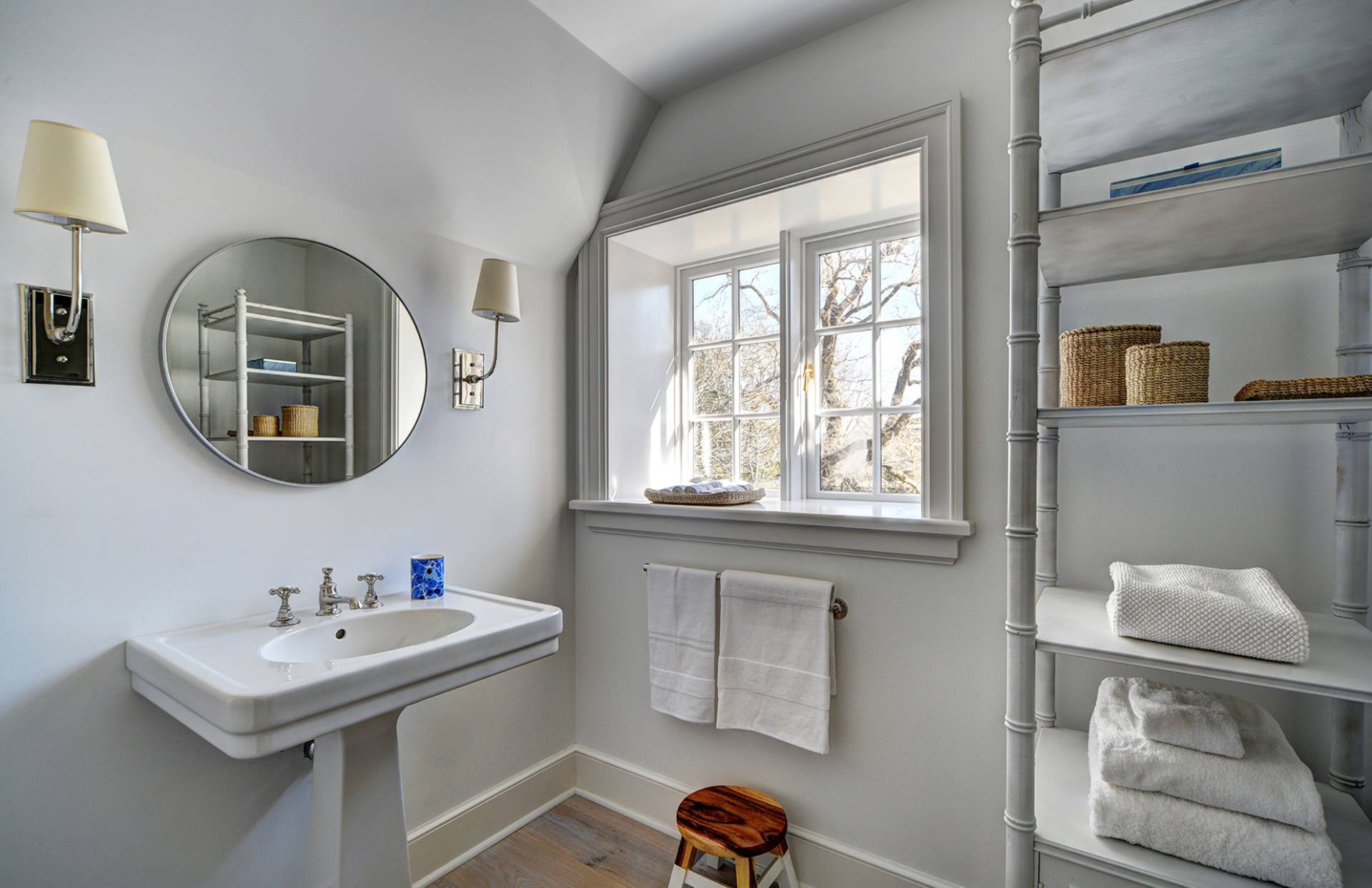 63 Middle Lane East Hampton, NY 11937 - Photo 34 of 39 a bathroom with a sink and a mirror
