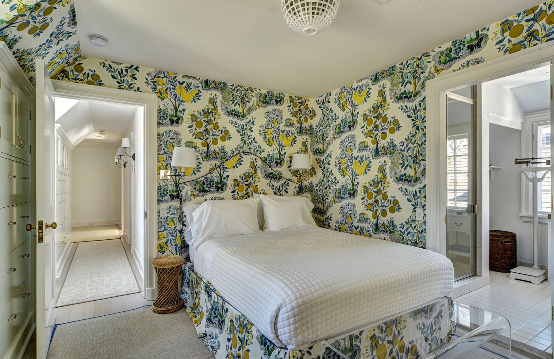 63 Middle Lane East Hampton, NY 11937 - Photo 36 of 39 a bedroom with a bed and a mirror