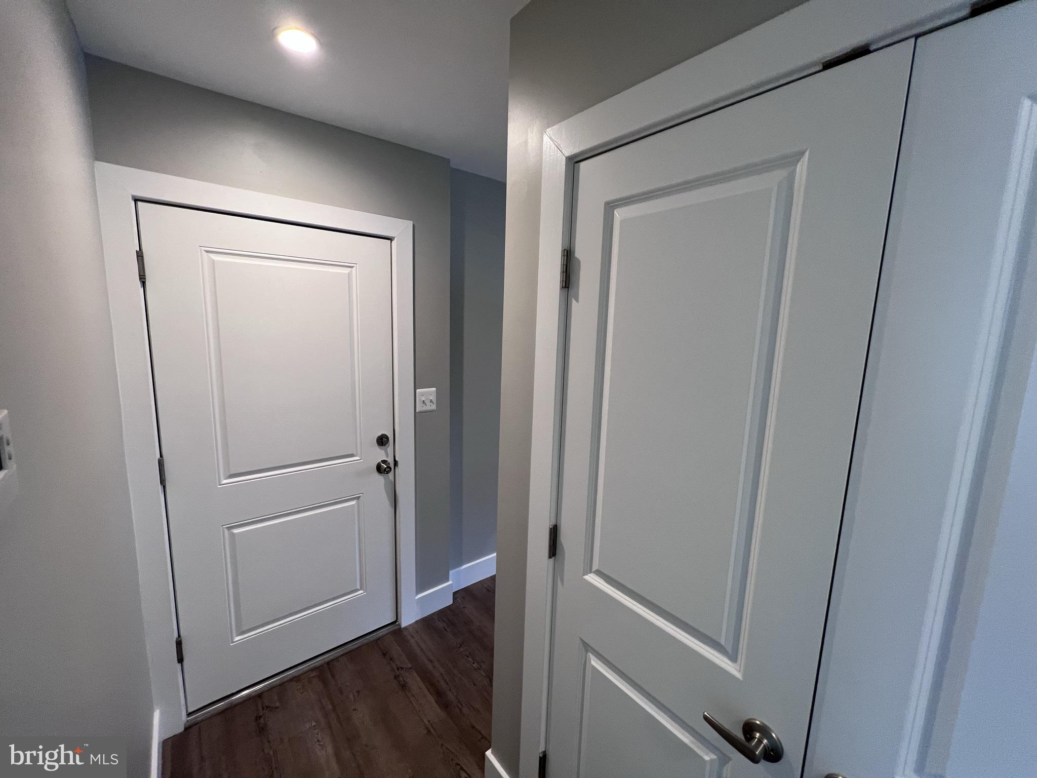447 Orange Street Southeast, Unit 3 Washington, DC 20032 - Photo 7 of 14 a view of a hallway with wooden floor