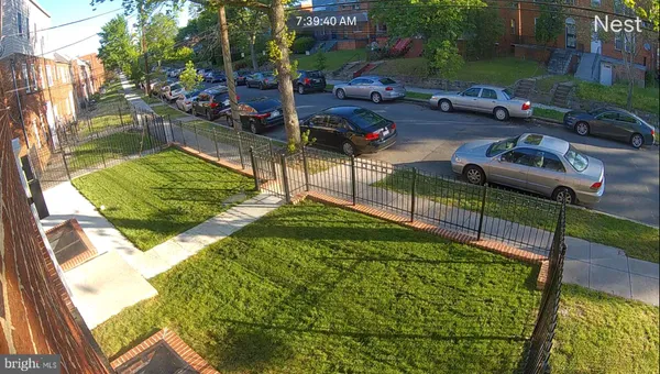 a view of living room with furniture and a window