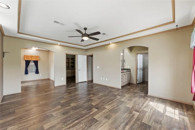 a bathroom with a sink a mirror and a shower