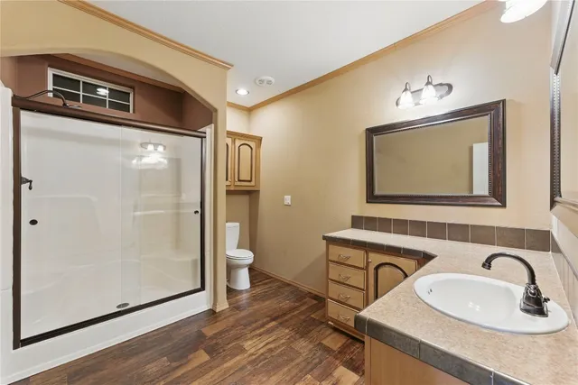 a view of an empty walk in closet