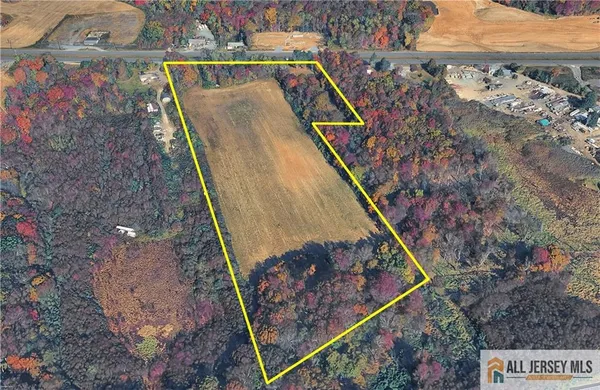 a view of swimming pool with a back yard