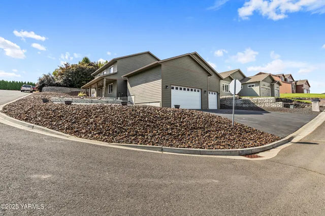 a view of a house with a street