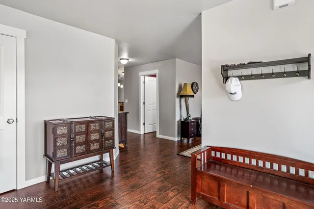 a view of entryway with wooden floor