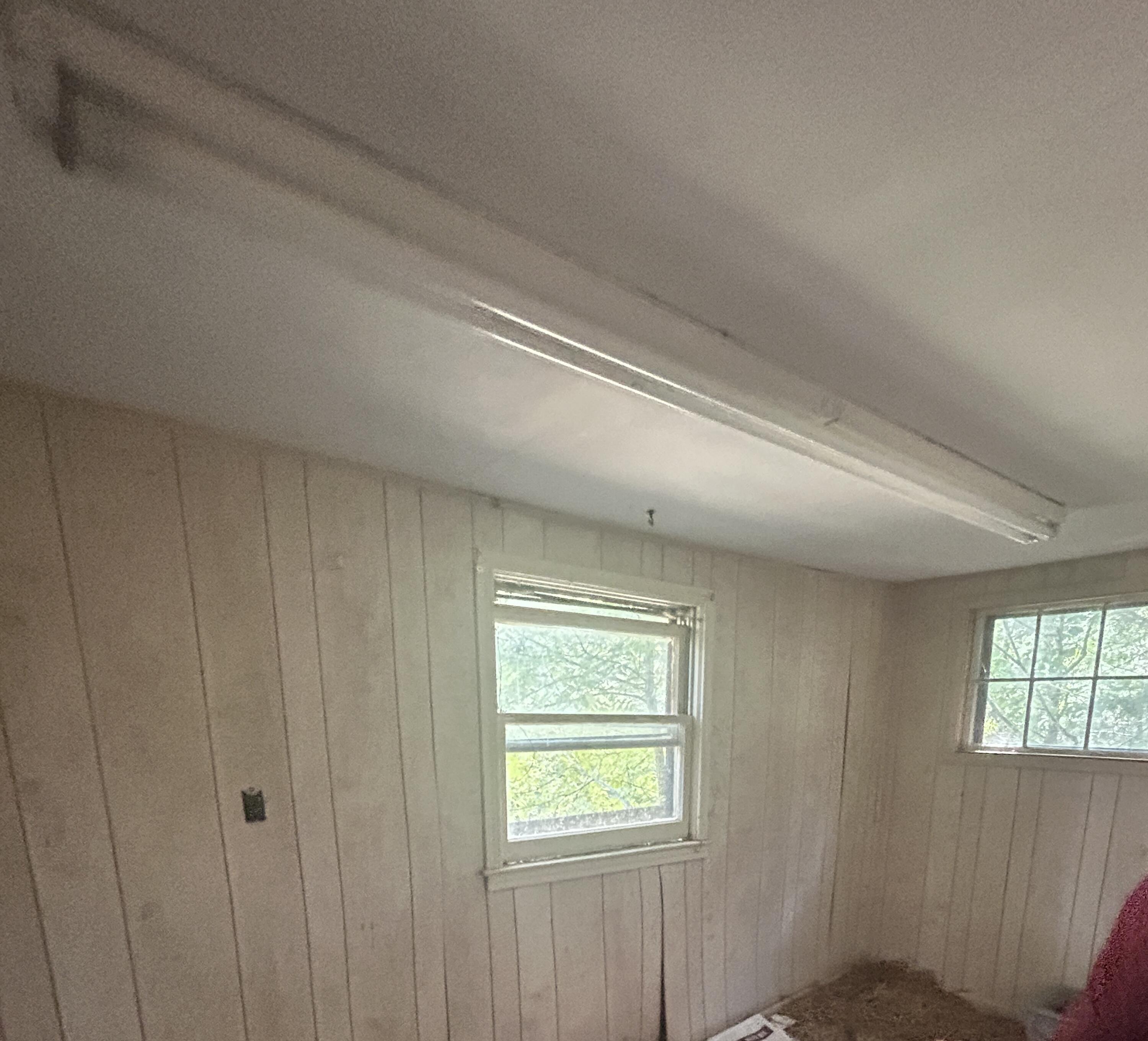 726 Old Brown Road Salvisa, KY 40372 - Photo 67 of 89 Large rear room on the back of secondary home. (it attached to the log home portion). Log home portion is in what appears to be good shape, rear of home, would need major renovation. It has not been lived in for well over a decade.