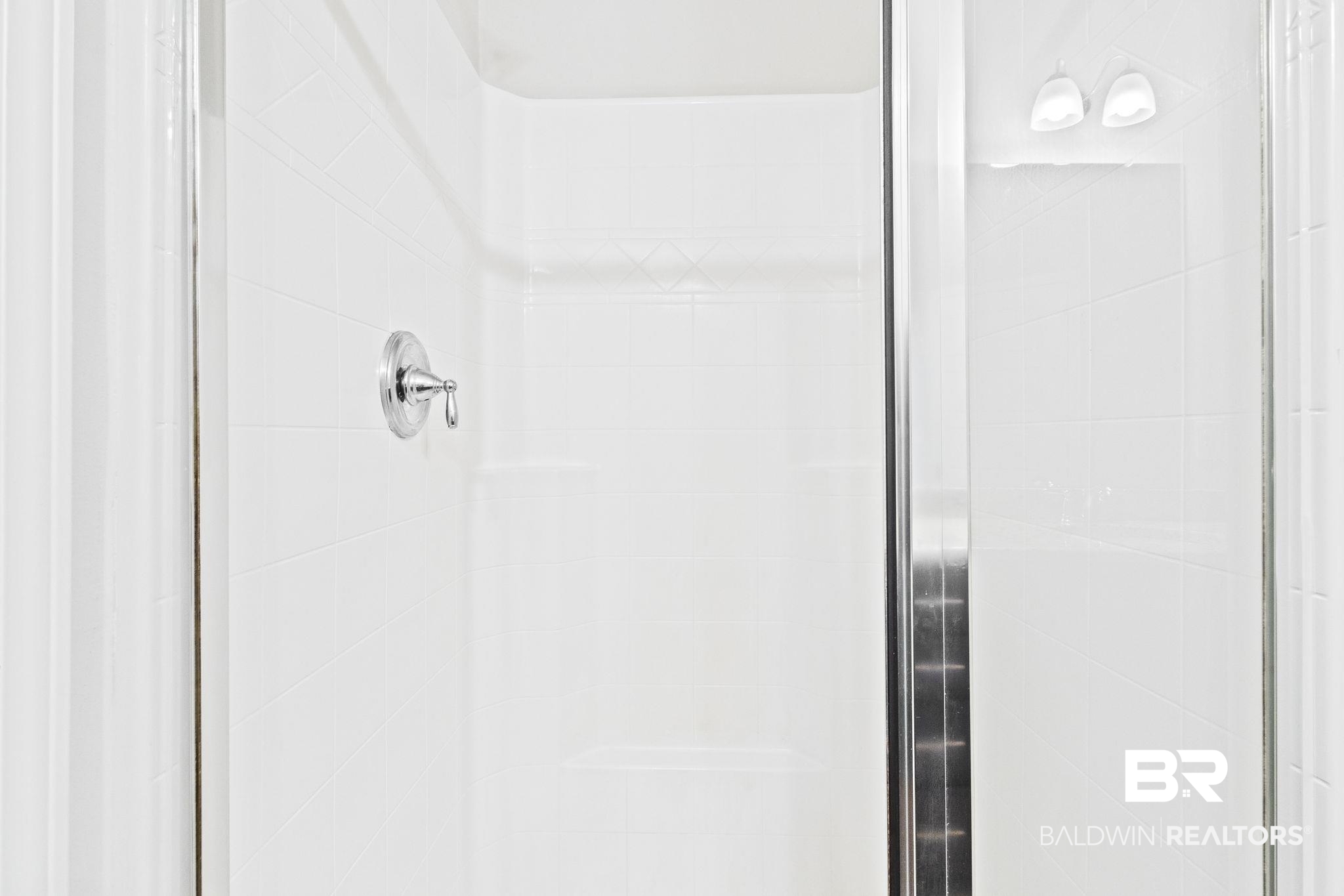 31643 Kestrel Loop Daphne, AL 36527 - Photo 26 of 59 Interior details featuring a shower with shower door