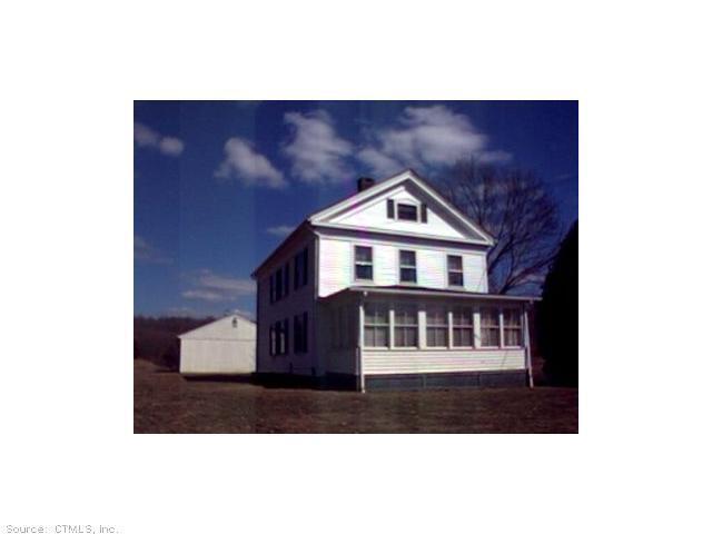 211 Cox Road Portland, CT 06480 - Photo 1 of 1 a front view of a house with a wooden floor