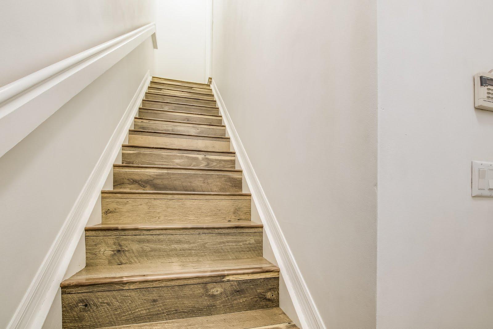 4312 Main Street Jupiter, FL 33458 - Photo 2 of 19 STAIRS TO 2ND FLOOR LIVING AREAS