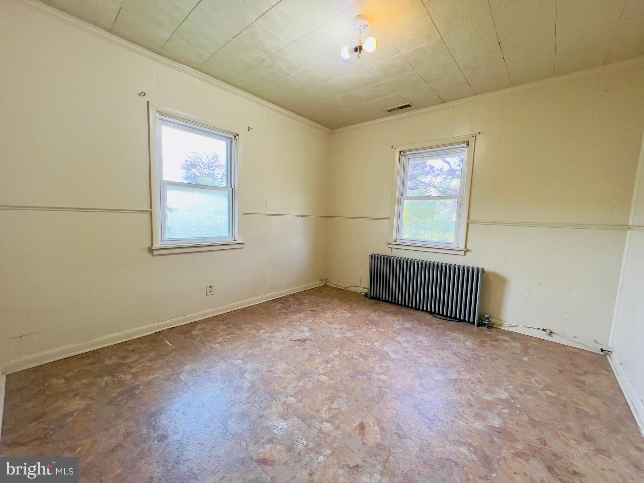 577 3rd Vineland, NJ 08360 - Photo 12 of 14 an empty room with windows