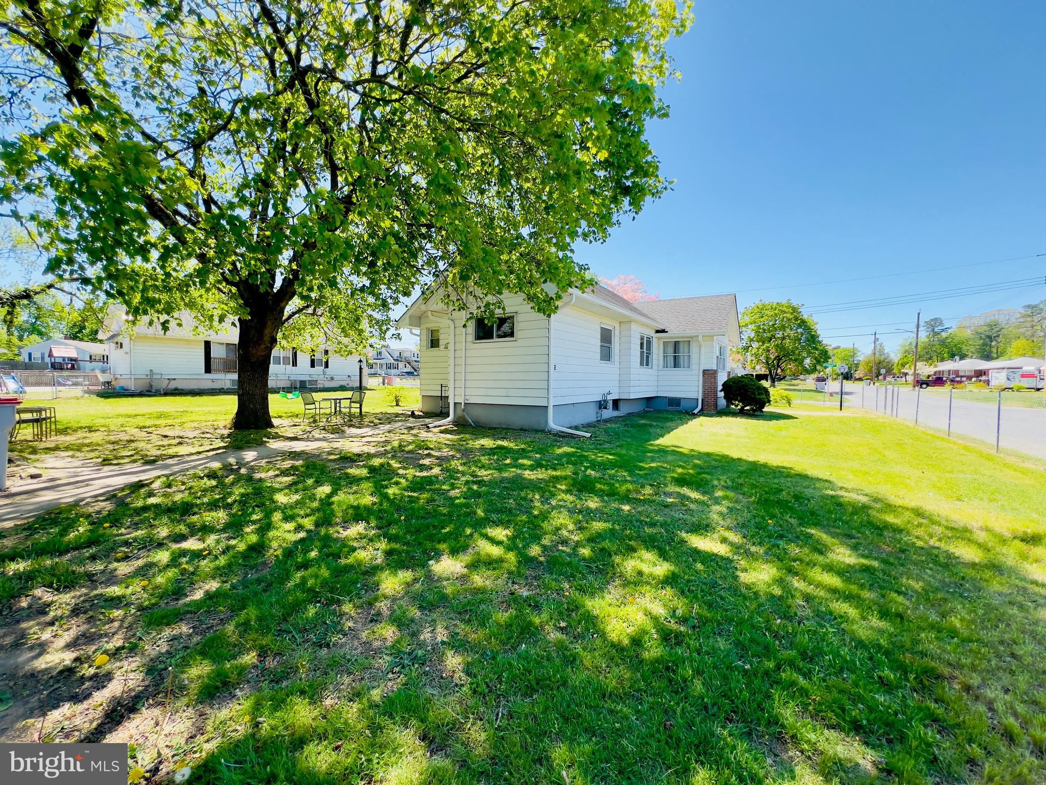 577 3rd Vineland, NJ 08360 - Photo 5 of 14 a view of a house with big yard and large trees