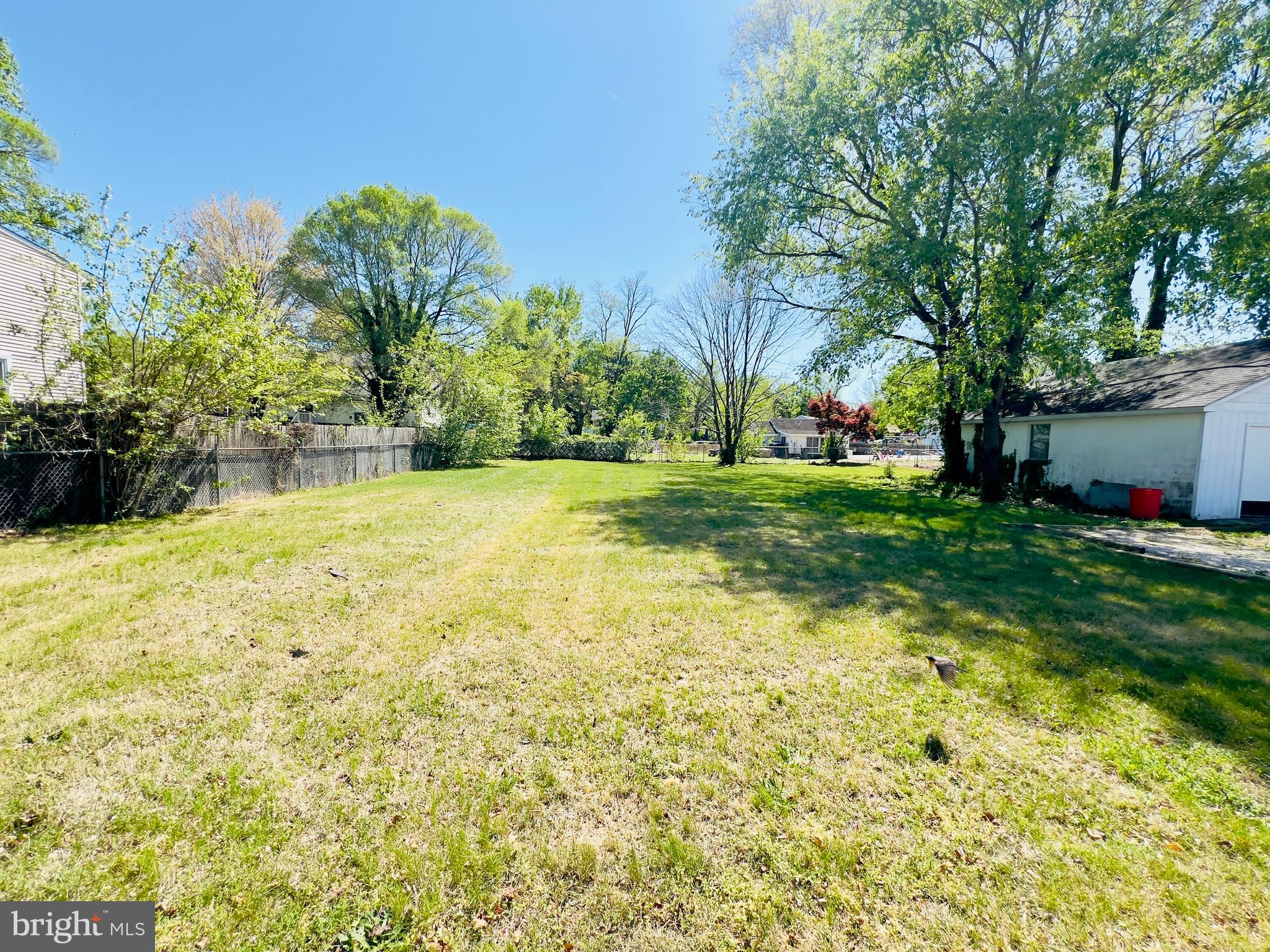 577 3rd Vineland, NJ 08360 - Photo 7 of 14 a swimming pool with outdoor seating and yard