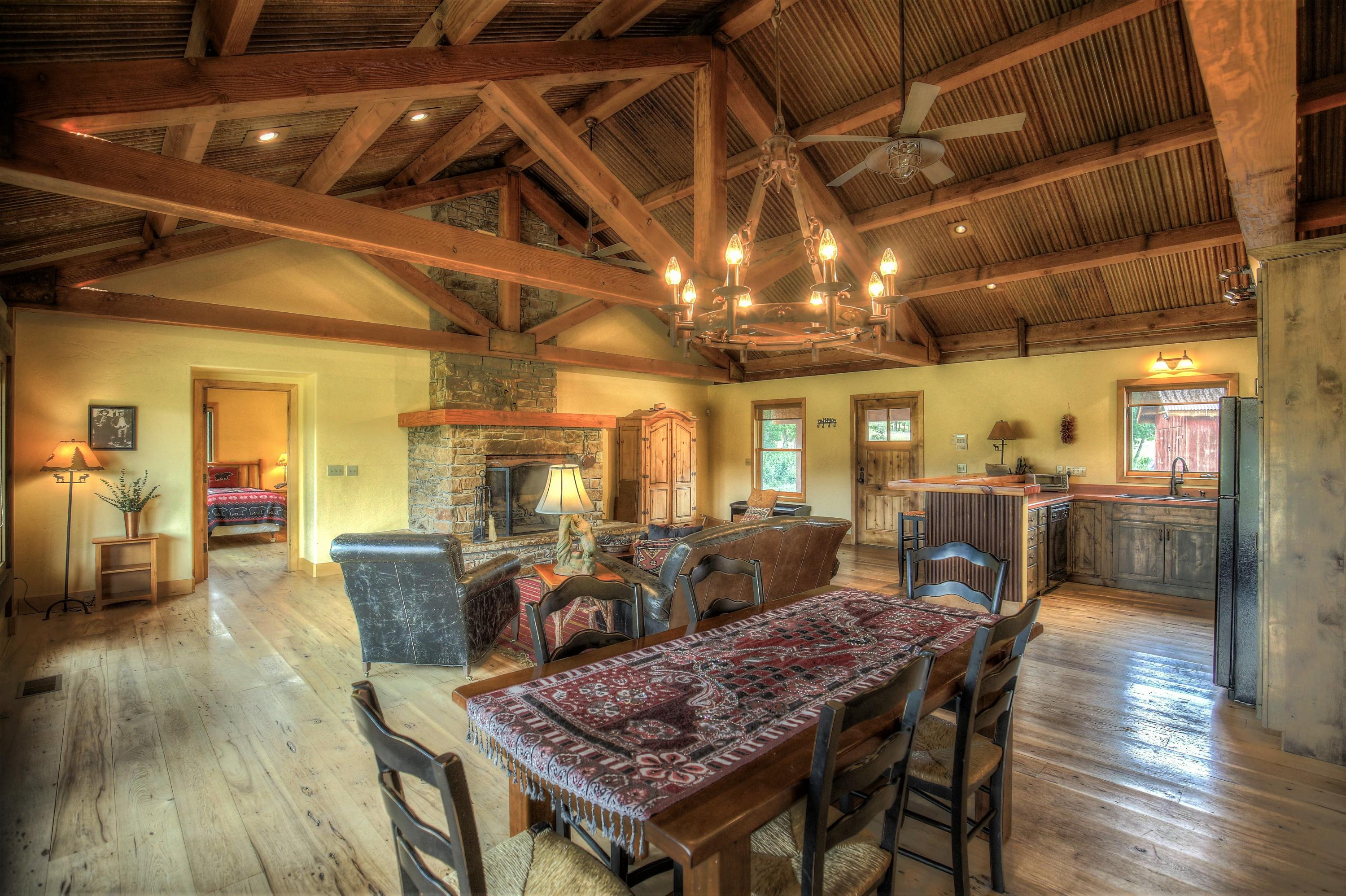 390 Peninsula Drive Placerville, CO 81430 - Photo 13 of 37 a view of a dining room with furniture