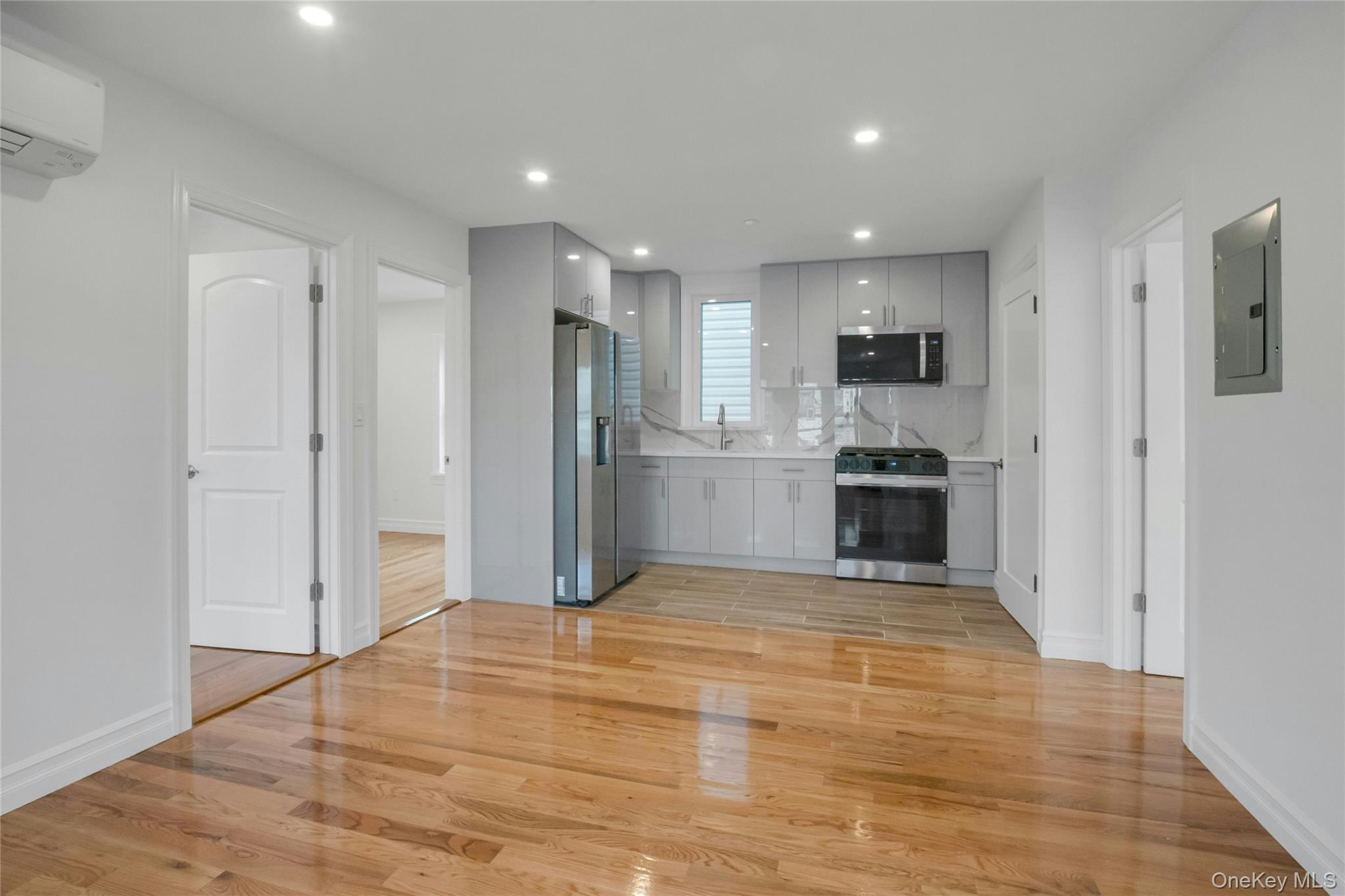25 Walnut Street New Rochelle, NY 10801 - Photo 11 of 29 a view of kitchen with refrigerator and microwave