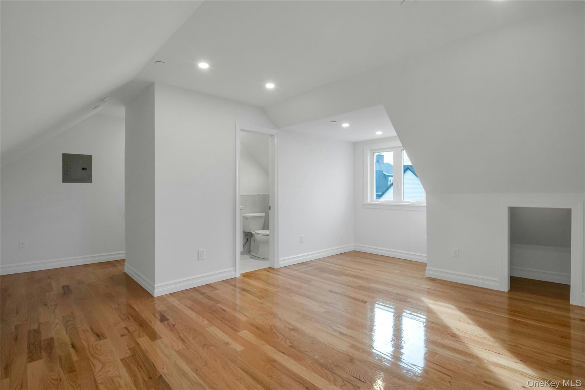 25 Walnut Street New Rochelle, NY 10801 - Photo 17 of 29 a view of empty room with wooden floor