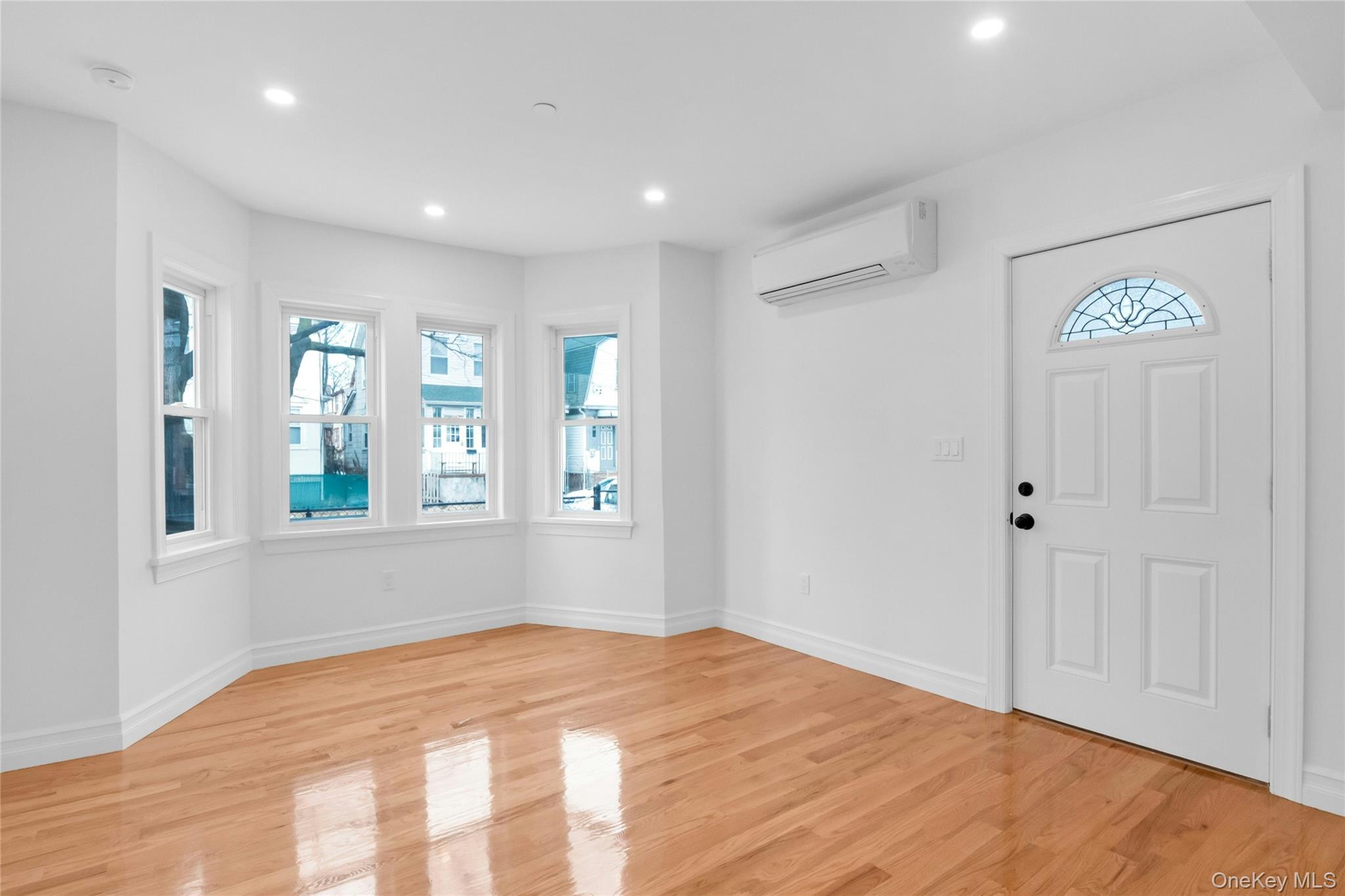 25 Walnut Street New Rochelle, NY 10801 - Photo 3 of 29 a view of empty room with window