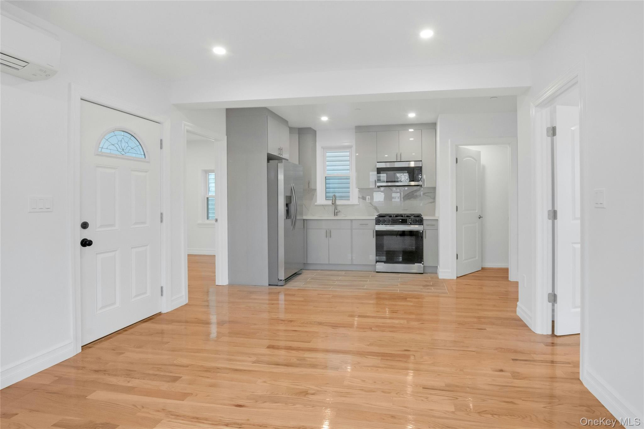25 Walnut Street New Rochelle, NY 10801 - Photo 29 of 29 a view of a kitchen with refrigerator and an oven