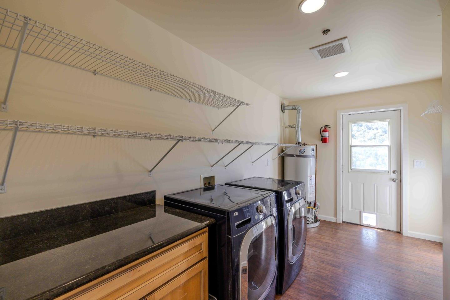 20510 Cachagua Road Carmel Valley, CA 93924 - Photo 20 of 45 a view of storage and utility room with stairs and ventilation