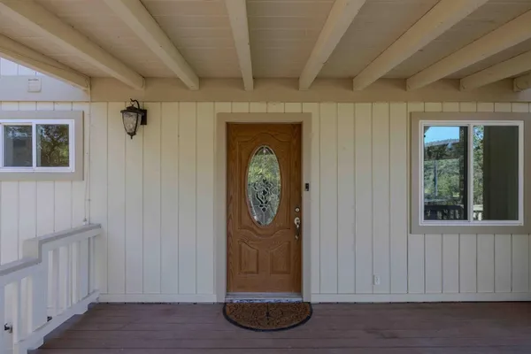a view of an entryway with a door