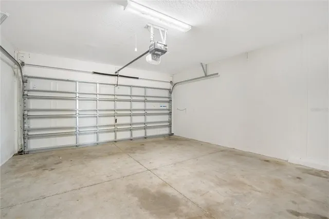 a view of an empty room with closet
