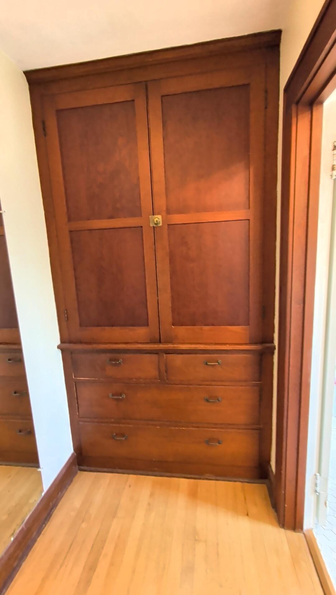 415 South Concord Road Oconomowoc, WI 53066 - Photo 24 of 39 One of multiple built-ins on the upper level, adding both charm and function.