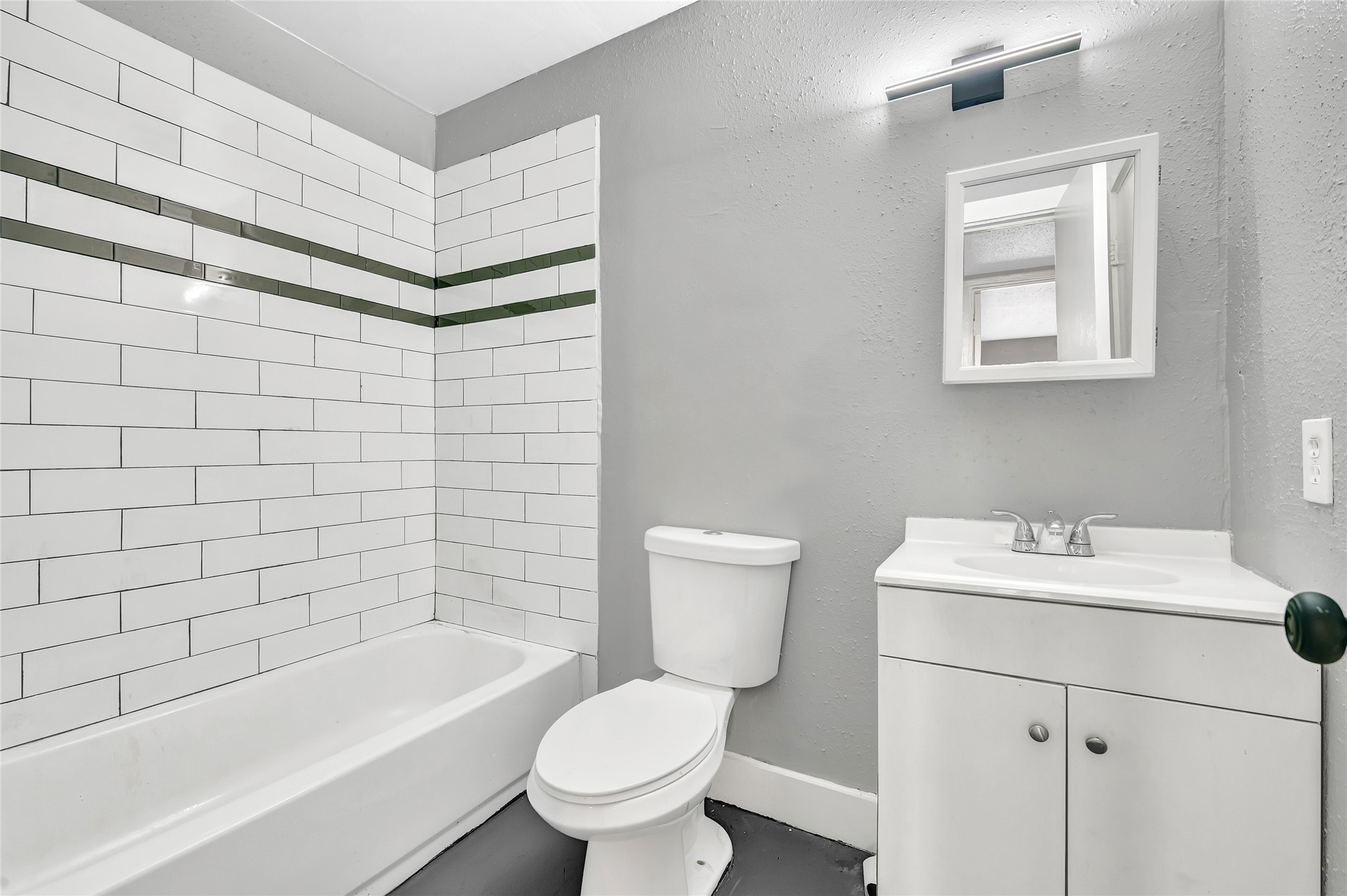 3802 Dabney Street, Unit 16 Houston, TX 77026 - Photo 8 of 13 a bathroom with a sink toilet and shower