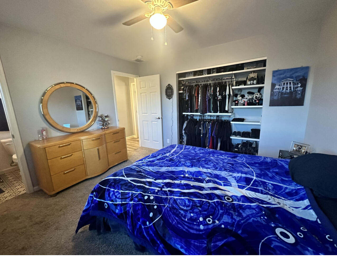 1680 2nd Street Anderson, CA 96007 - Photo 22 of 31 a bedroom with a bed and dresser