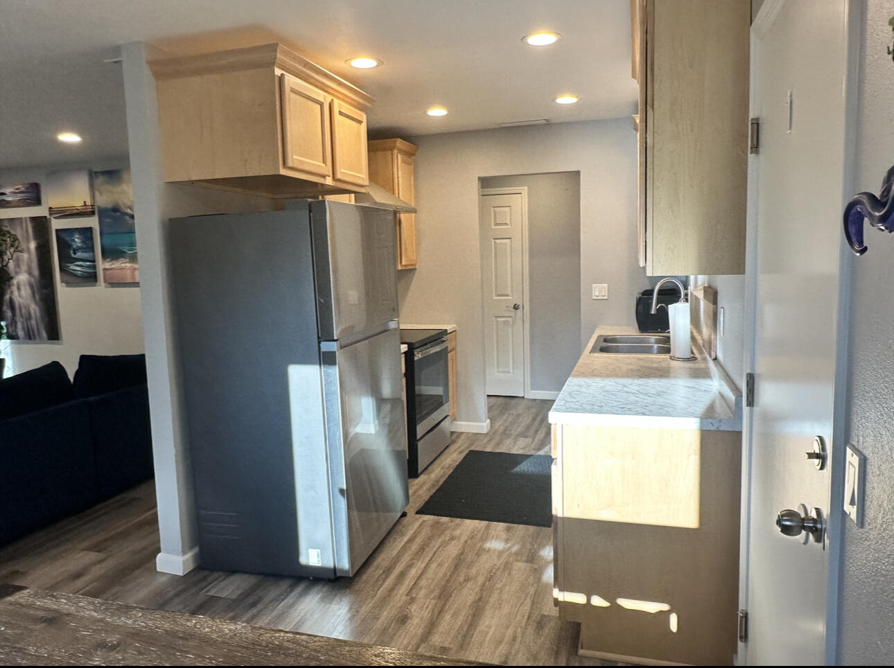1680 2nd Street Anderson, CA 96007 - Photo 7 of 31 a kitchen with a refrigerator and a sink