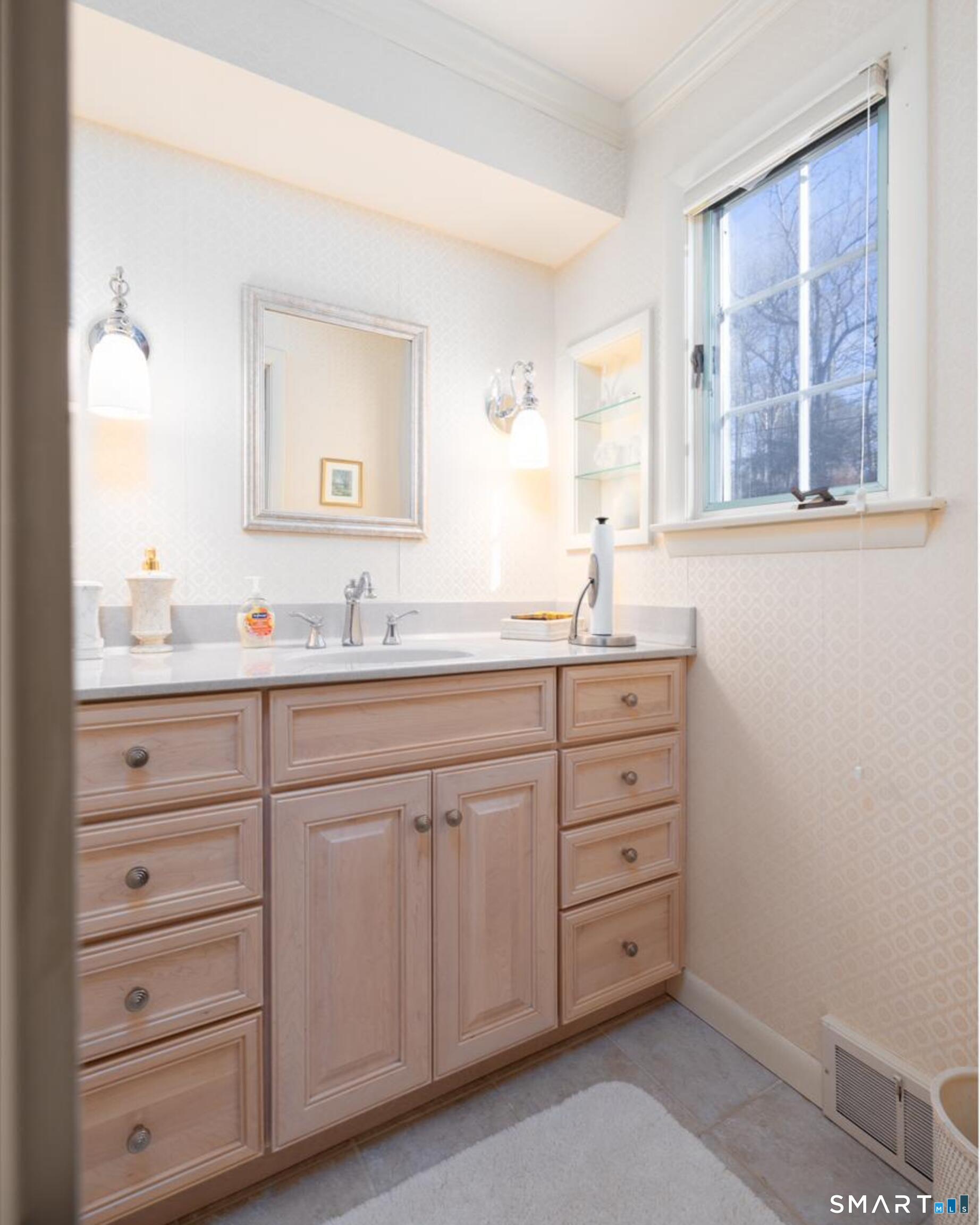 117 Crest Road Middlebury, CT 06762 - Photo 22 of 38 First floor guest half bath with water closet.