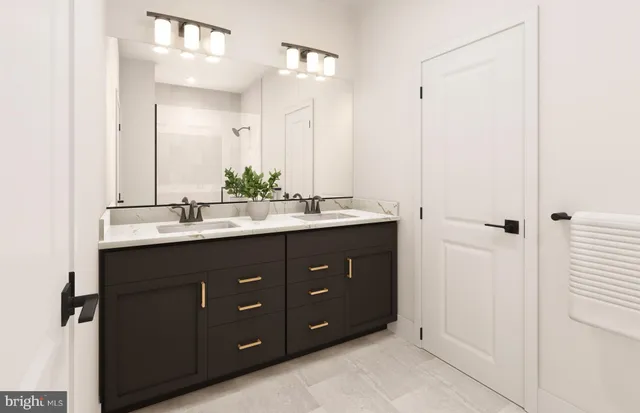 a bathroom with a double vanity sink and mirror